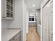 Kitchen hallway with built-in cabinets and granite countertops at 4338 Spinnaker Cove Ln, Tampa, FL 33615