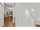 Hallway view of living room with hardwood floors at 4338 Spinnaker Cove Ln, Tampa, FL 33615
