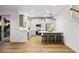 Modern kitchen with grey cabinets, granite countertops and island at 4338 Spinnaker Cove Ln, Tampa, FL 33615