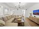 L-Shaped sectional sofa in open living room at 4338 Spinnaker Cove Ln, Tampa, FL 33615