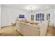 Spacious living room with large sectional sofa at 4338 Spinnaker Cove Ln, Tampa, FL 33615