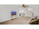 Open living area with TV and access to patio at 4338 Spinnaker Cove Ln, Tampa, FL 33615