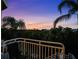 Tranquil sunset view from private balcony with seating at 4338 Spinnaker Cove Ln, Tampa, FL 33615