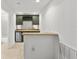 Basement wet bar with granite countertop and wine rack at 4338 Spinnaker Cove Ln, Tampa, FL 33615