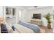 Bright bedroom with wood-look floors and large closet at 801 83Rd N Ave # 120, St Petersburg, FL 33702