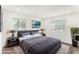 Inviting bedroom with a comfortable bed, neutral decor, and large windows at 801 83Rd N Ave # 120, St Petersburg, FL 33702