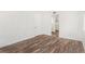 Spacious bedroom with hardwood floors and a walk-in closet at 801 83Rd N Ave # 120, St Petersburg, FL 33702