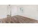 Bright bedroom featuring wood-look floors, recessed lighting, and neutral walls at 801 83Rd N Ave # 120, St Petersburg, FL 33702