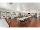 Spacious common area with tables, chairs, and a Christmas tree, perfect for gatherings at 801 83Rd N Ave # 120, St Petersburg, FL 33702