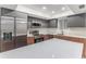 Modern kitchen with stainless steel appliances and island at 801 83Rd N Ave # 120, St Petersburg, FL 33702