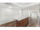 Bright living area featuring wood-look floors, recessed lighting, and neutral walls at 801 83Rd N Ave # 120, St Petersburg, FL 33702