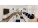 Bright living room with hardwood floors and modern furniture at 801 83Rd N Ave # 120, St Petersburg, FL 33702