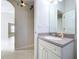 Clean bathroom with granite countertop and single sink vanity at 8109 N Edison Ave, Tampa, FL 33604