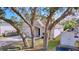 Cute one-story home with mature trees and fenced yard at 8109 N Edison Ave, Tampa, FL 33604