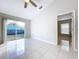 Gathering room with sliding glass doors leading to backyard at 8109 N Edison Ave, Tampa, FL 33604