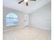 Living room with tile floors and a ceiling fan at 8109 N Edison Ave, Tampa, FL 33604
