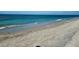 Stunning beachfront view with clear water and sandy shore at 12300 Vonn Rd # 6103, Largo, FL 33774