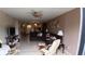 Comfortable living room featuring brown sofas and a recliner at 12300 Vonn Rd # 6103, Largo, FL 33774