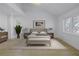 Main bedroom with vaulted ceilings, shiplap walls, and hardwood floors at 1355 Pinellas Bayway S # 23, Tierra Verde, FL 33715