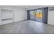 Spacious bonus room with sliding glass doors leading to a patio at 1355 Pinellas Bayway S # 23, Tierra Verde, FL 33715