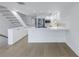 Modern white kitchen with stainless steel appliances at 1355 Pinellas Bayway S # 23, Tierra Verde, FL 33715