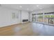Spacious living area with hardwood floors and fireplace at 1355 Pinellas Bayway S # 23, Tierra Verde, FL 33715