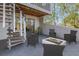 Relaxing patio with fire pit and seating area near spiral staircase at 1355 Pinellas Bayway S # 23, Tierra Verde, FL 33715