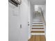 Bright and airy entryway with modern staircase at 1355 Pinellas Bayway S # 23, Tierra Verde, FL 33715