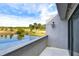Private balcony overlooking a peaceful lake and golf course at 13635 Twin Lakes Ln # 13635, Tampa, FL 33618
