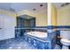 Spa-like bathroom with walk-in shower and large soaking tub at 13635 Twin Lakes Ln # 13635, Tampa, FL 33618