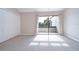 Bedroom with private balcony and neutral decor at 13635 Twin Lakes Ln # 13635, Tampa, FL 33618
