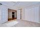 Spacious bedroom with built-in shelving and hardwood floors at 13635 Twin Lakes Ln # 13635, Tampa, FL 33618