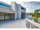 Spacious deck with lake view and access to the home at 13635 Twin Lakes Ln # 13635, Tampa, FL 33618