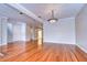Empty dining room with hardwood floors at 13635 Twin Lakes Ln # 13635, Tampa, FL 33618