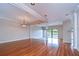 Spacious dining room featuring hardwood floors at 13635 Twin Lakes Ln # 13635, Tampa, FL 33618