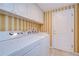 Laundry room with washer, dryer, and cabinets at 13635 Twin Lakes Ln # 13635, Tampa, FL 33618