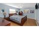 Bedroom with wood furniture and light blue walls at 1392 Overlea Dr, Dunedin, FL 34698