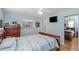 Bedroom with wood furniture and light blue walls at 1392 Overlea Dr, Dunedin, FL 34698