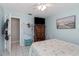 Bright bedroom with double bed and built-in wardrobe at 1392 Overlea Dr, Dunedin, FL 34698