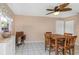 Bright dining area with wood table and chairs at 1392 Overlea Dr, Dunedin, FL 34698