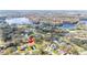 Stunning aerial view of a lakeside community showcasing beautiful houses and mature trees in a desirable location at 22368 Southshore Dr, Land O Lakes, FL 34639