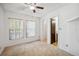 Bedroom featuring carpet, closet and ceiling fan at 22368 Southshore Dr, Land O Lakes, FL 34639