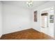 Dining room highlighting parquet floors, neutral walls, and access to kitchen at 22368 Southshore Dr, Land O Lakes, FL 34639