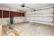 Spacious garage with storage shelves at 22368 Southshore Dr, Land O Lakes, FL 34639