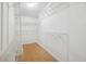 Walk-in closet with built-in wire shelving at 22368 Southshore Dr, Land O Lakes, FL 34639