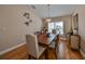 Elegant dining room with hardwood floors and a wood dining table at 2337 Platinum Dr, Sun City Center, FL 33573