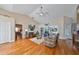 Bright living room with hardwood floors, vaulted ceilings and access to bedroom at 2337 Platinum Dr, Sun City Center, FL 33573