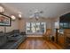 Relaxing living room with hardwood floors and large windows at 2337 Platinum Dr, Sun City Center, FL 33573