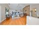 Spacious living room with hardwood floors and sliding doors to patio at 2337 Platinum Dr, Sun City Center, FL 33573