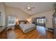 Spacious main bedroom with hardwood floors and a sitting area at 2337 Platinum Dr, Sun City Center, FL 33573
